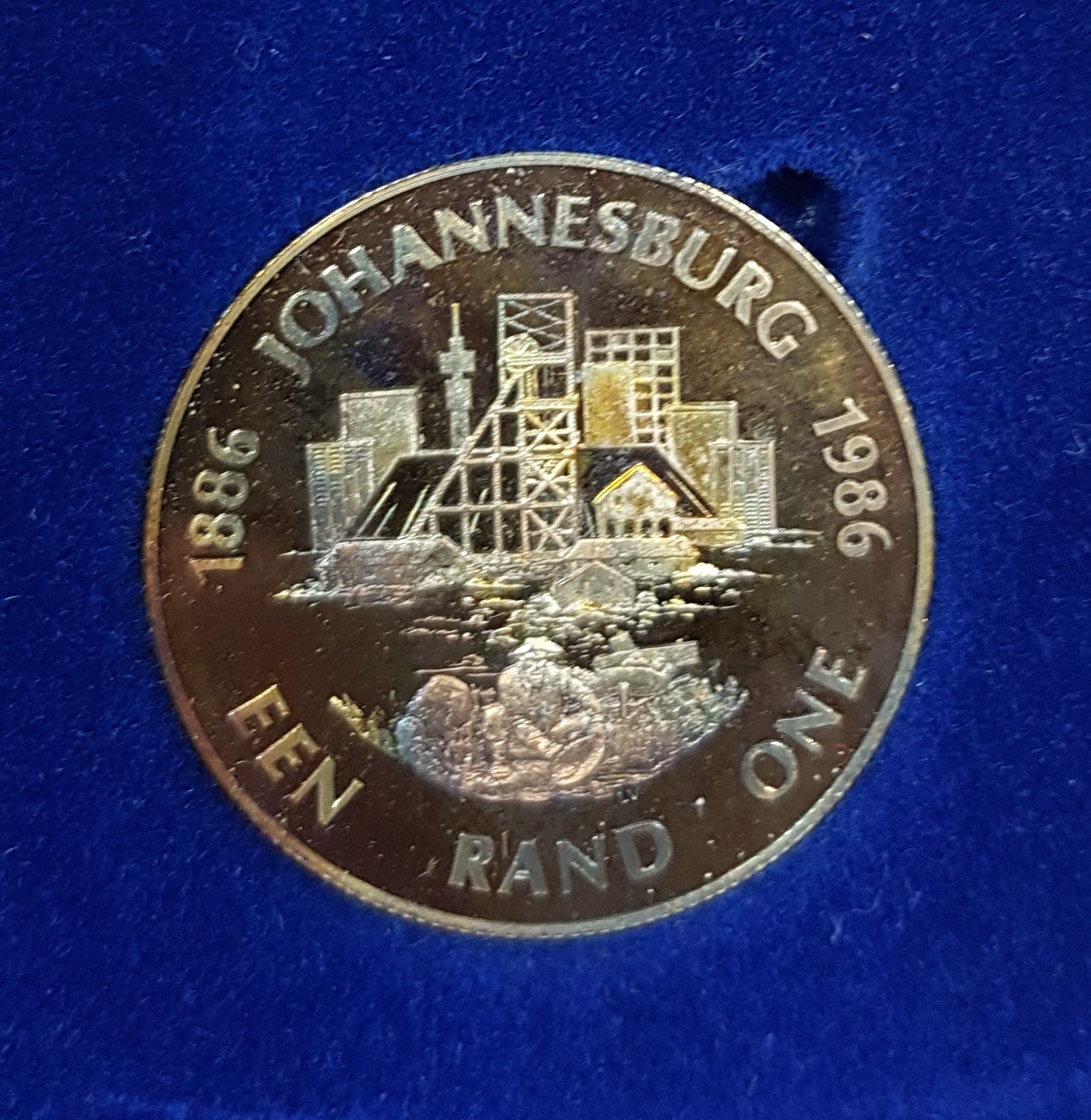 SA 1986 JOHANNESBURG 100 PROOF SILVER ONE RAND