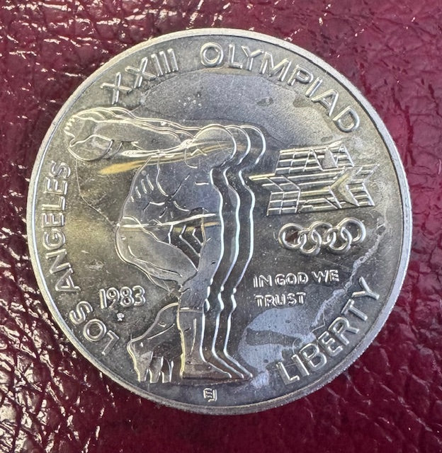 1983 OLYMPIC SILVER USA LIBERTY DOLLAR